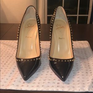 Christian Louboutin spiked pumps.